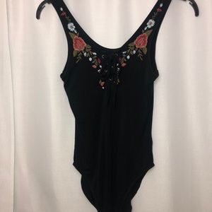 embroidered , body suit